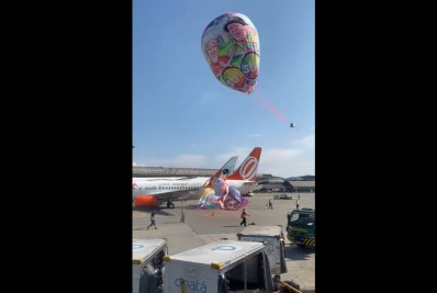 Balão cai em aeroporto de Guarulhos e cobre parte de um avião