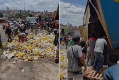 Multidão avança em carga de cerveja após carreta tombar em rodovia