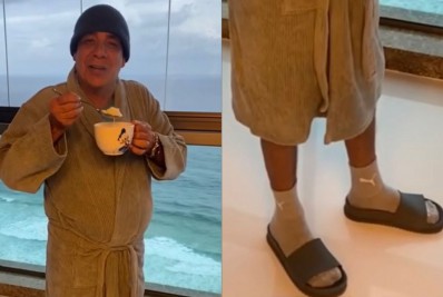 De roupão, meia e chinelo, Zeca Pagodinho representa cariocas com chegada da frente fria: 'Tomando canjica'