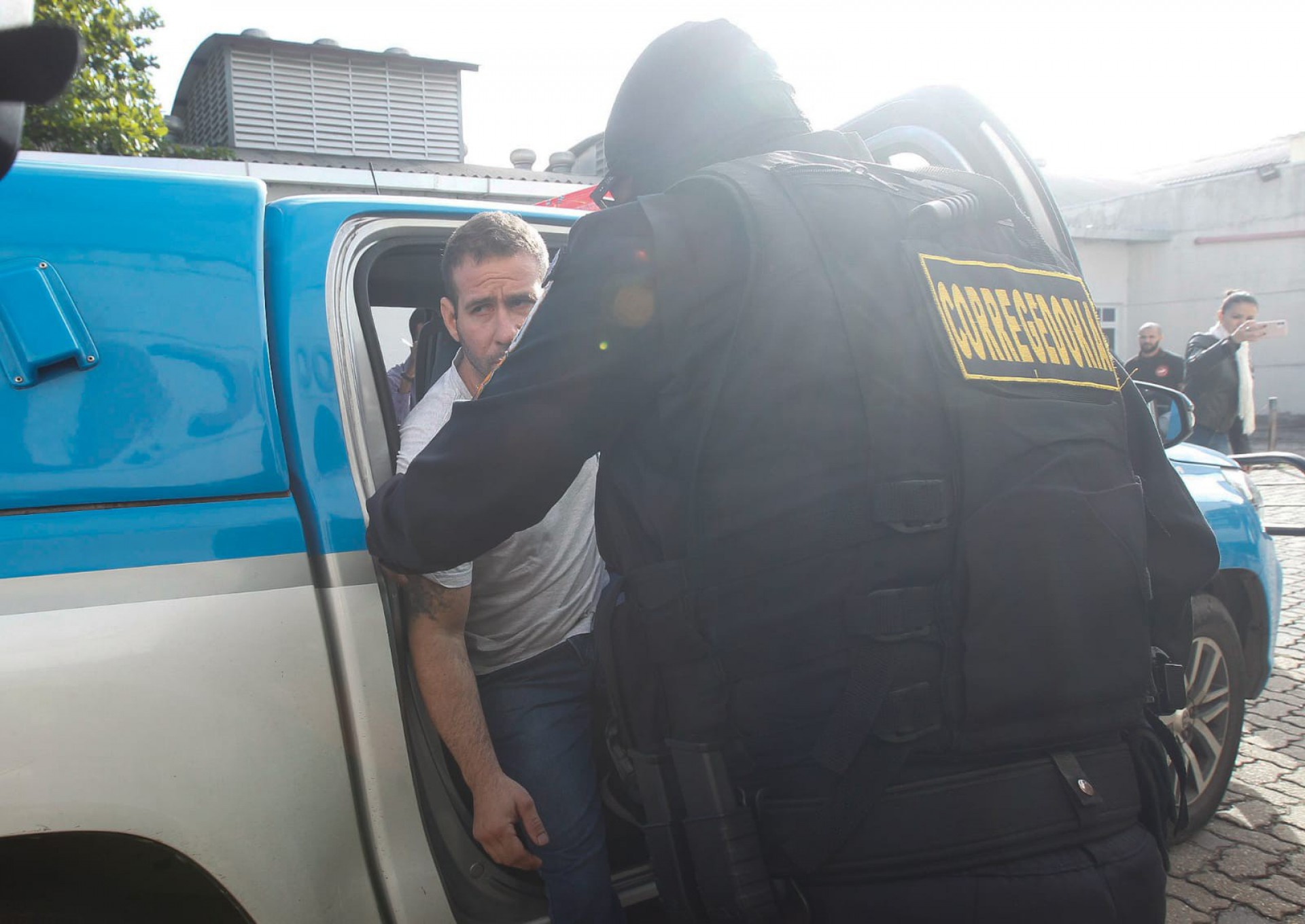 Preso em operação chega à Cidade da Polícia - Reginaldo Pimenta/ Agência O Dia
