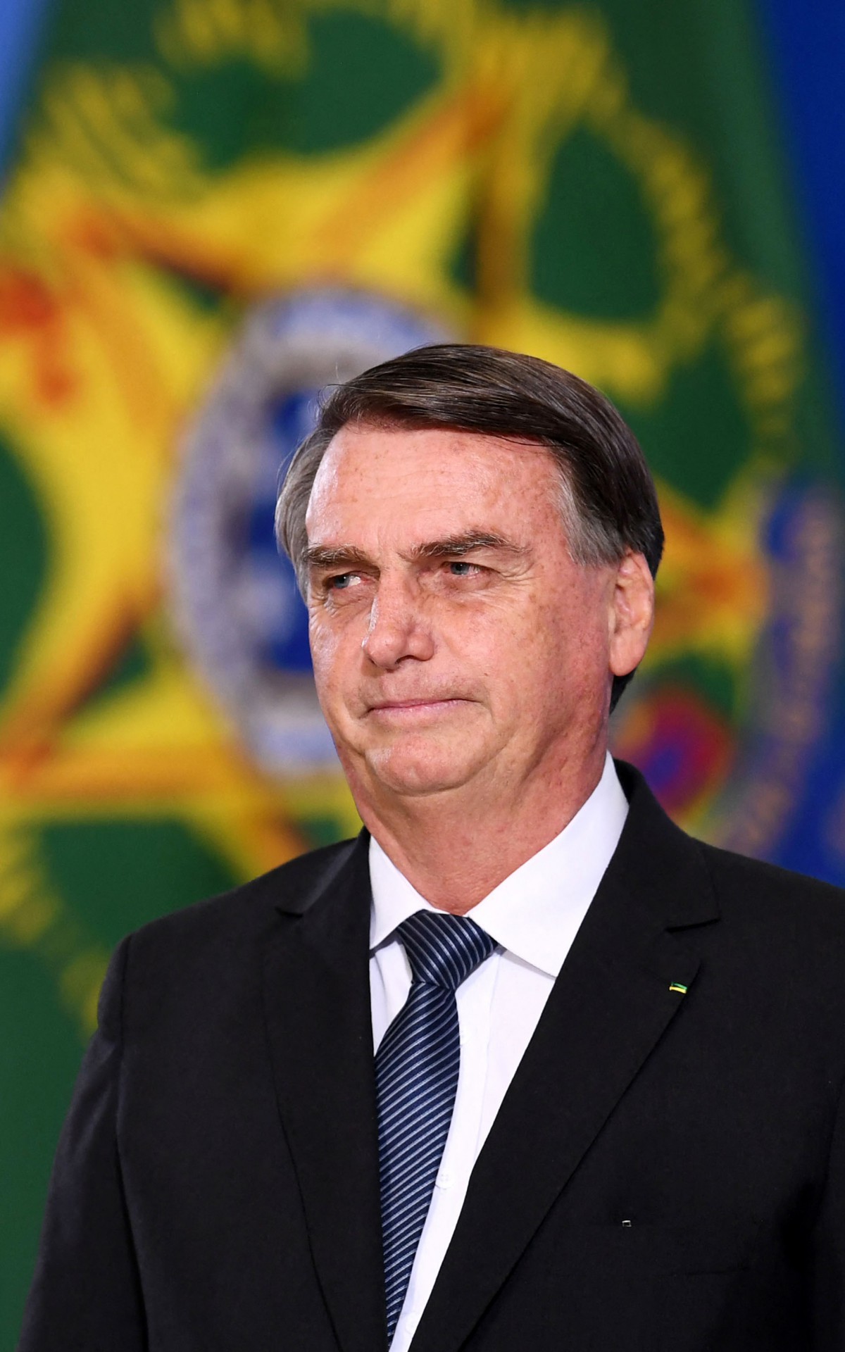 View of the silhouette of Brazilian President Jair Bolsonaro on arrival at the promotion ceremony of General Officers of the Armed Forces, at Planalto Palace in Brasilia, on August 4, 2022.
EVARISTO SA / AFP - EVARISTO SA / AFP