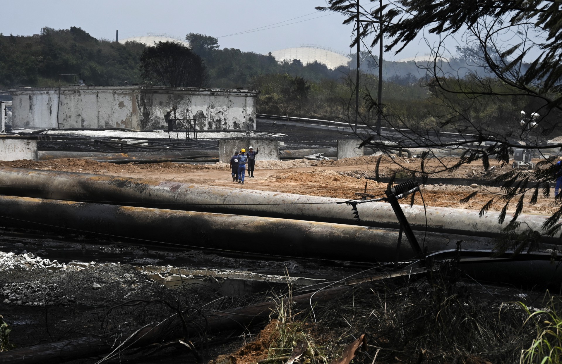 Cuba se despede das vítimas de incêndio em tanques de petróleo - YAMIL LAGE / AFP