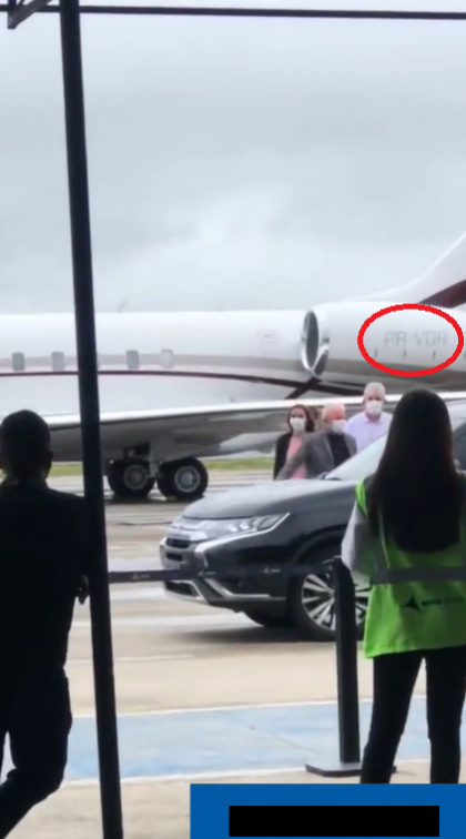 Print do vídeo em verificação em que é possível ver a matrícula do avião usado por Lula - Reprodução