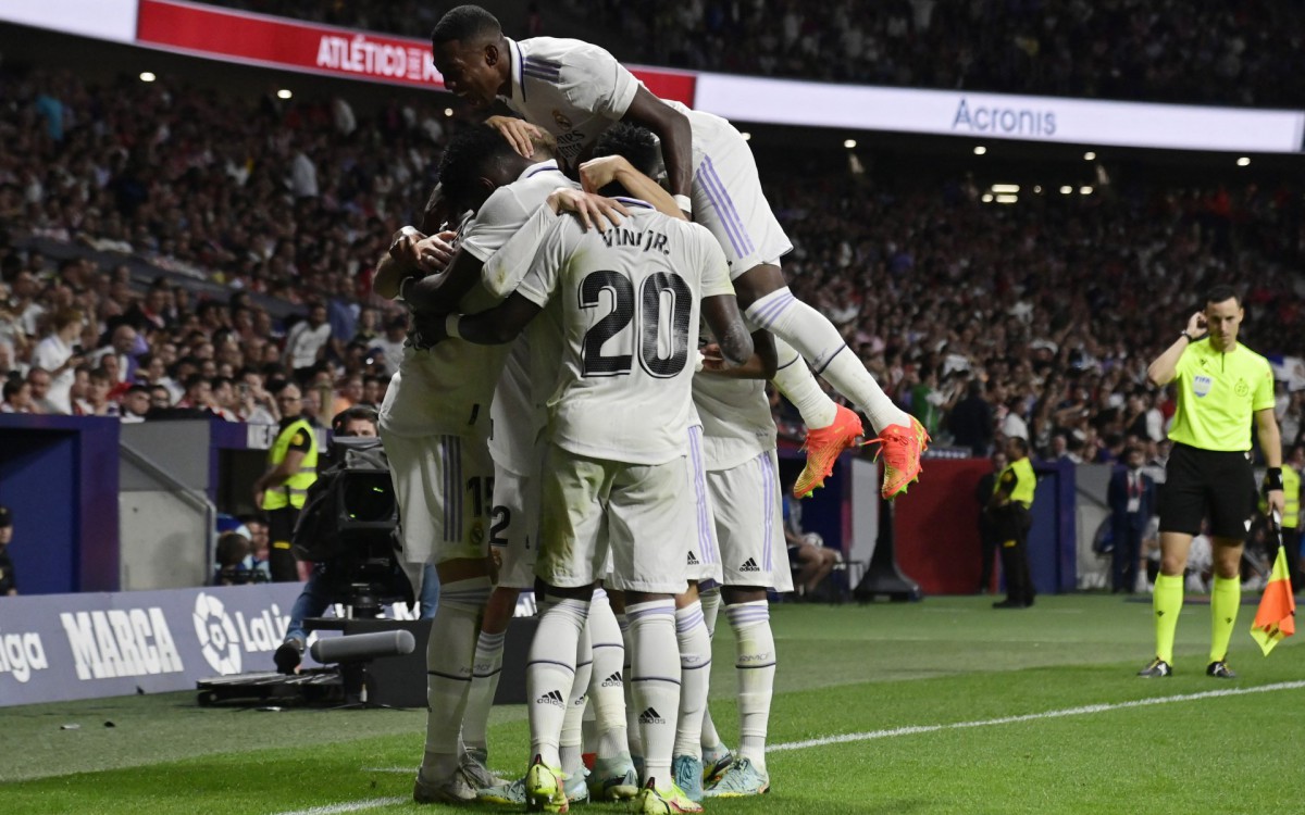 FBL-ESP-LIGA-ATLETICO MADRID-REAL MADRID
Real Madrid's players celebrate after the team second goal during the Spanish League football match between Club Atletico de Madrid and Real Madrid CF at the Wanda Metropolitano stadium in Madrid on September 18, 2022.
JAVIER SORIANO / AFP - AFP