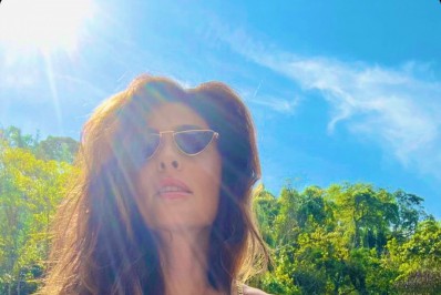 Juliana Paes atualiza seu Twitter com foto de passeio na cachoeira