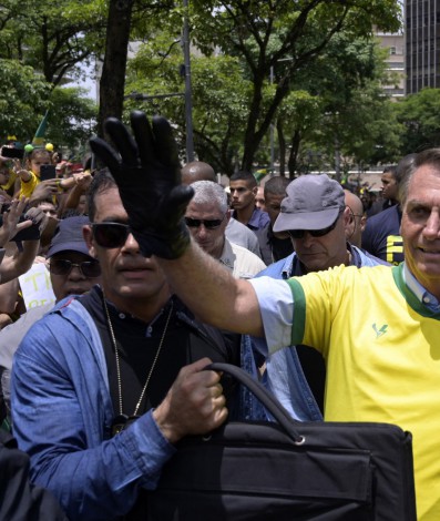 Brazil's President and re-election candidate Jair Bolsonaro waves during a campaign rally in Belo Horizonte, Minas Gerais, Brazil, on October 29, 2022, on the eve of the presidential election runoff. After a bitterly divisive campaign and inconclusive first-round vote, Brazil will elect its next president on October 30, in a cliffhanger runoff between far-right incumbent Jair Bolsonaro and veteran leftist Luiz Inacio Lula da Silva.
DOUGLAS MAGNO / AFP

