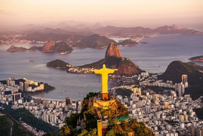 Cristo Redentor ganha iluminação laranja para alertar sobre câncer de pele nesta quinta-feira