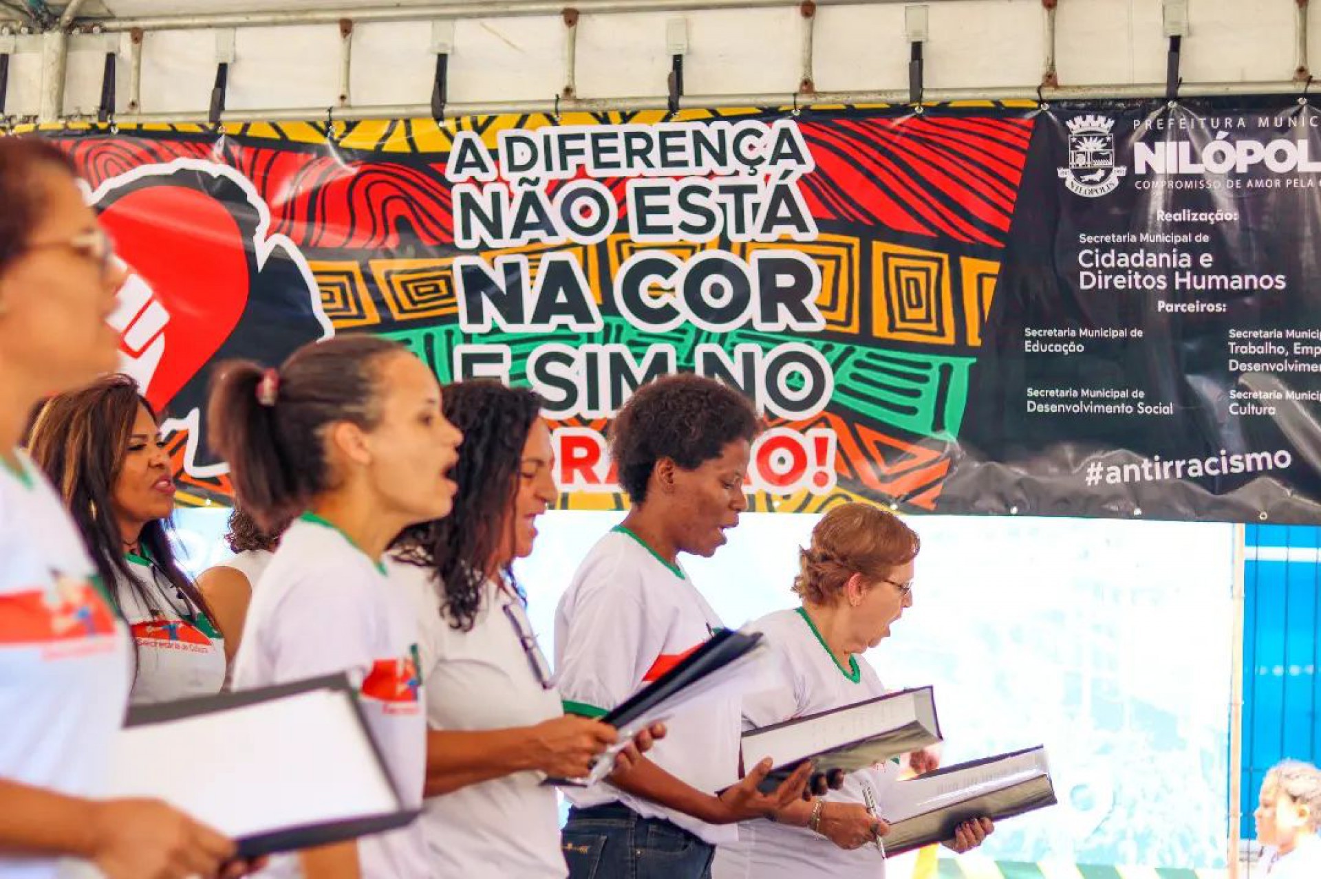 O evento foi intitulado "A diferen&ccedil;a n&atilde;o est&aacute; na cor e sim no cora&ccedil;&atilde;o" - Divulga&ccedil;&atilde;o / PMN