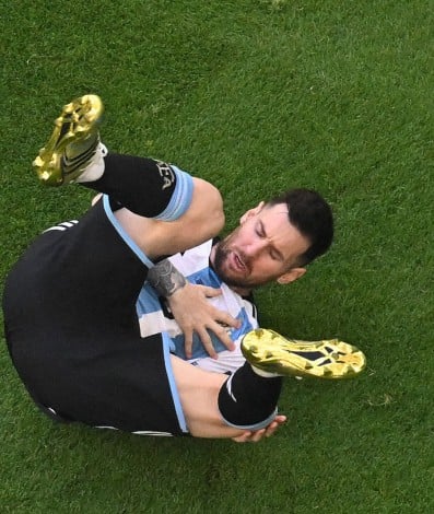 Argentina's forward #10 Lionel Messi reacts after a challenge during the Qatar 2022 World Cup Group C football match between Argentina and Saudi Arabia at the Lusail Stadium in Lusail, north of Doha on November 22, 2022.
Antonin THUILLIER / AFP