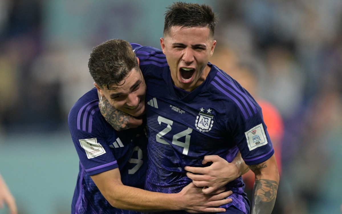 Argentina's forward #09 Julian Alvarez (L) celebrates with Argentina's midfielder #24 Enzo Fernandez after he scored his team's second goal during the Qatar 2022 World Cup Group C football match between Poland and Argentina at Stadium 974 in Doha on November 30, 2022.
JUAN MABROMATA / AFP - JUAN MABROMATA / AFP