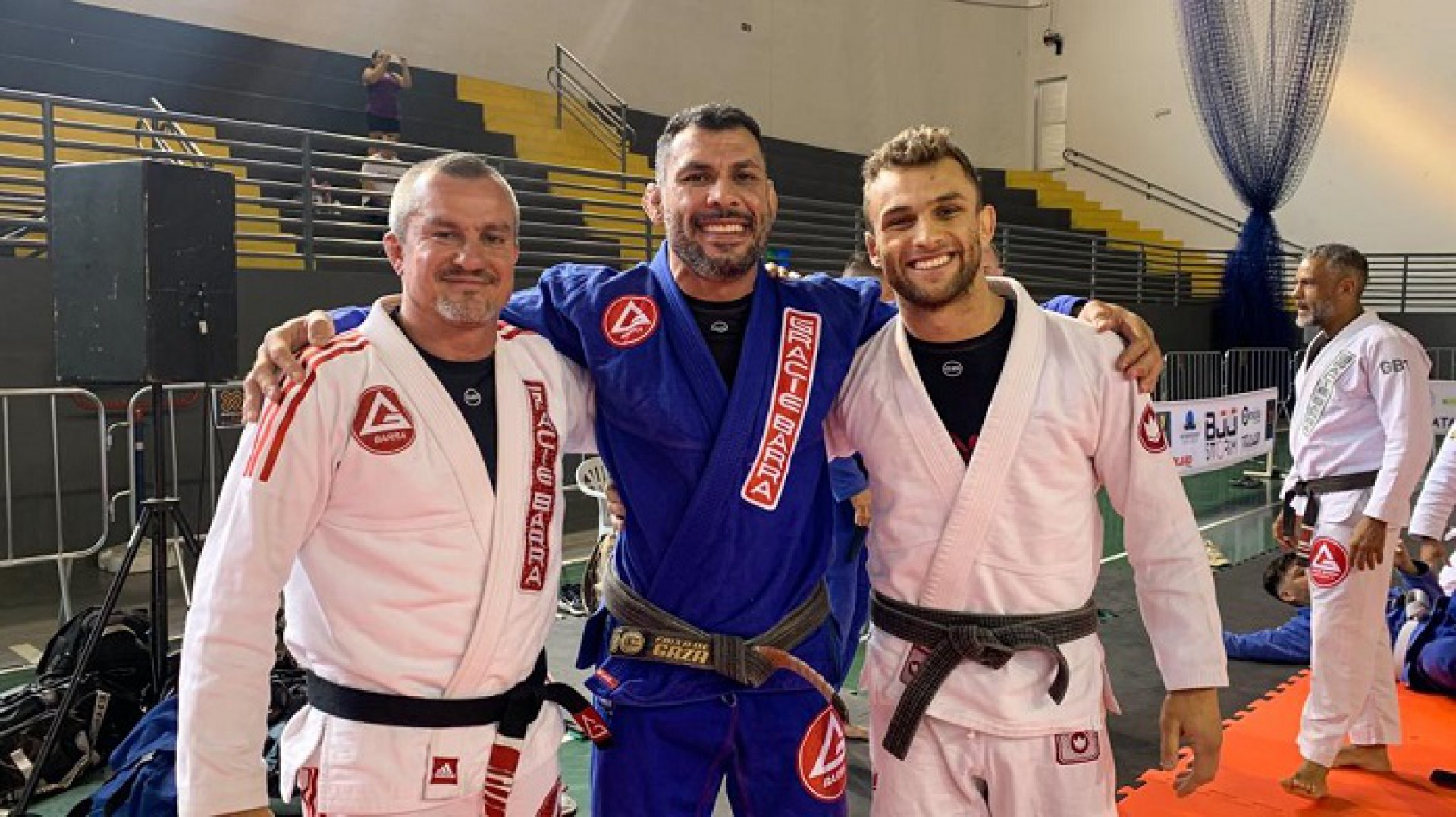 Vinicius Draculino, Claudio Caloquinha e Lucas Valente em semin&aacute;rio no BJJ Storm 2  - (Foto: Dai Bueno)