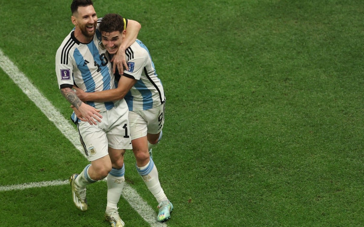 Argentina's forward #09 Julian Alvarez celebrates with Argentina's forward #10 Lionel Messi after scoring his team's second goal during the Qatar 2022 World Cup football semi-final match between Argentina and Croatia at Lusail Stadium in Lusail, north of Doha on December 13, 2022.
Adrian DENNIS / AFP - Adrian DENNIS / AFP