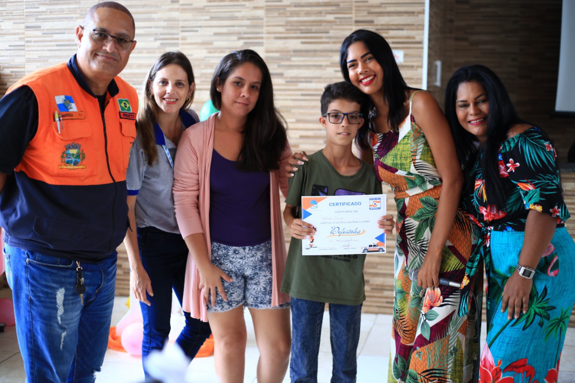 Nathan Souza recebeu o diploma e participou animado dos encontros. O menino quer ser bombeiro - Rafael Barreto / PMBR