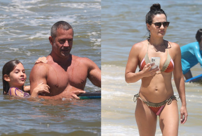 Malvino Salvador e Kyra Gracie se refrescam em dia de praia com os filhos