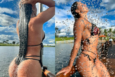 De biquíni, Graciele Lacerda exibe as curvas durante banho de chuveirão