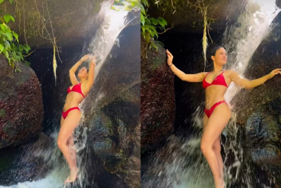 Larissa Manoela se refresca em banho de cachoeira