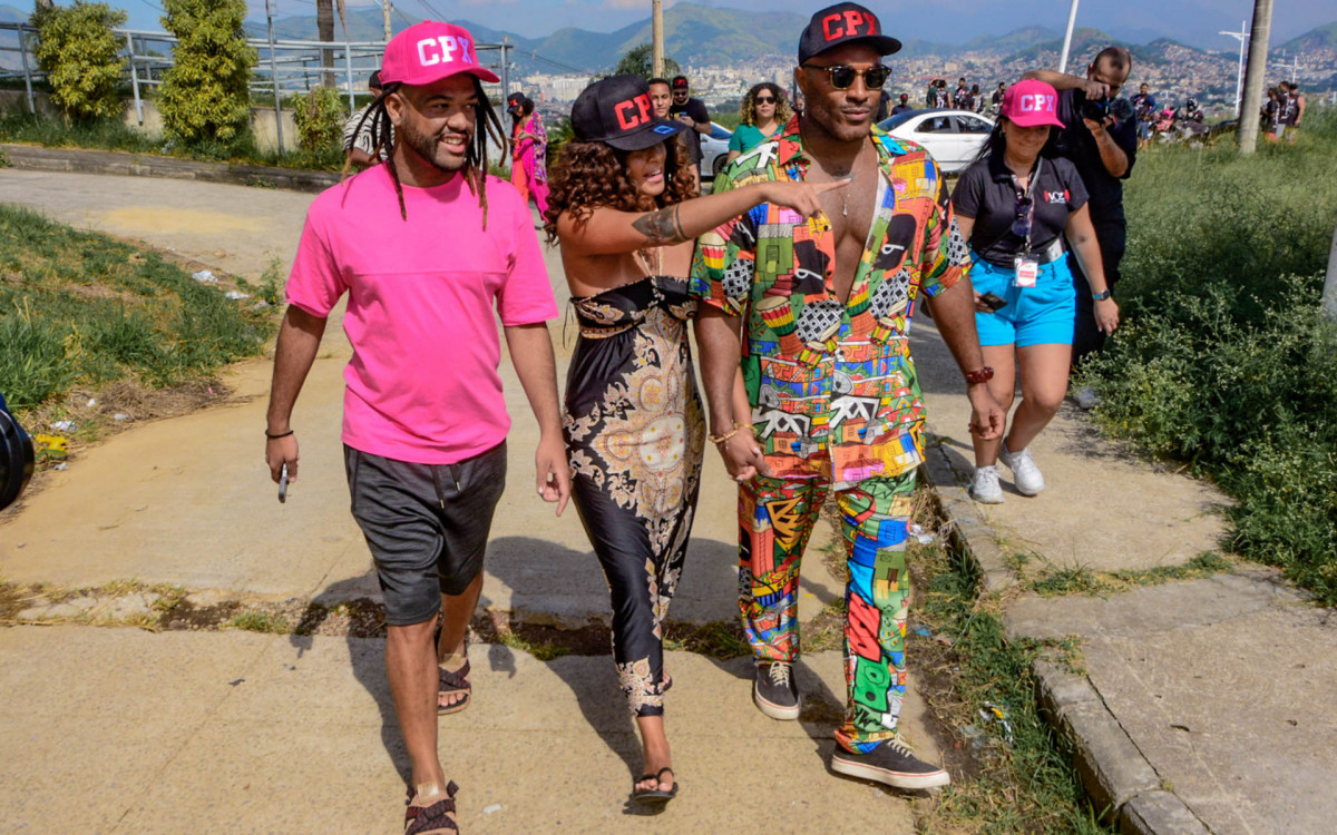 René Silva, Fred Nicácio e Domitila Barros no Complexo do Alemão