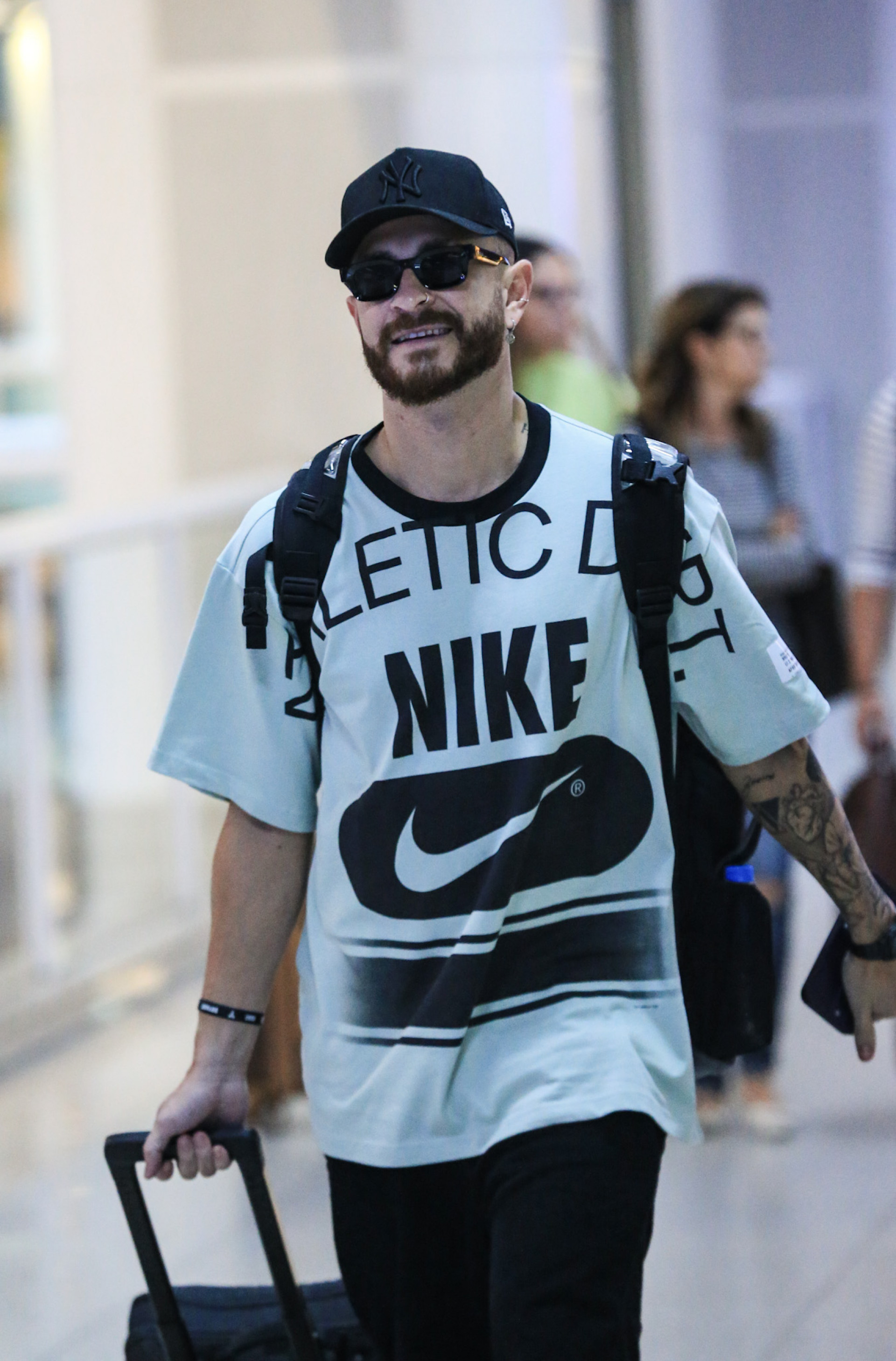 Fred Bruno embarca em Aeroporto do Rio - Pereira/Ag. News