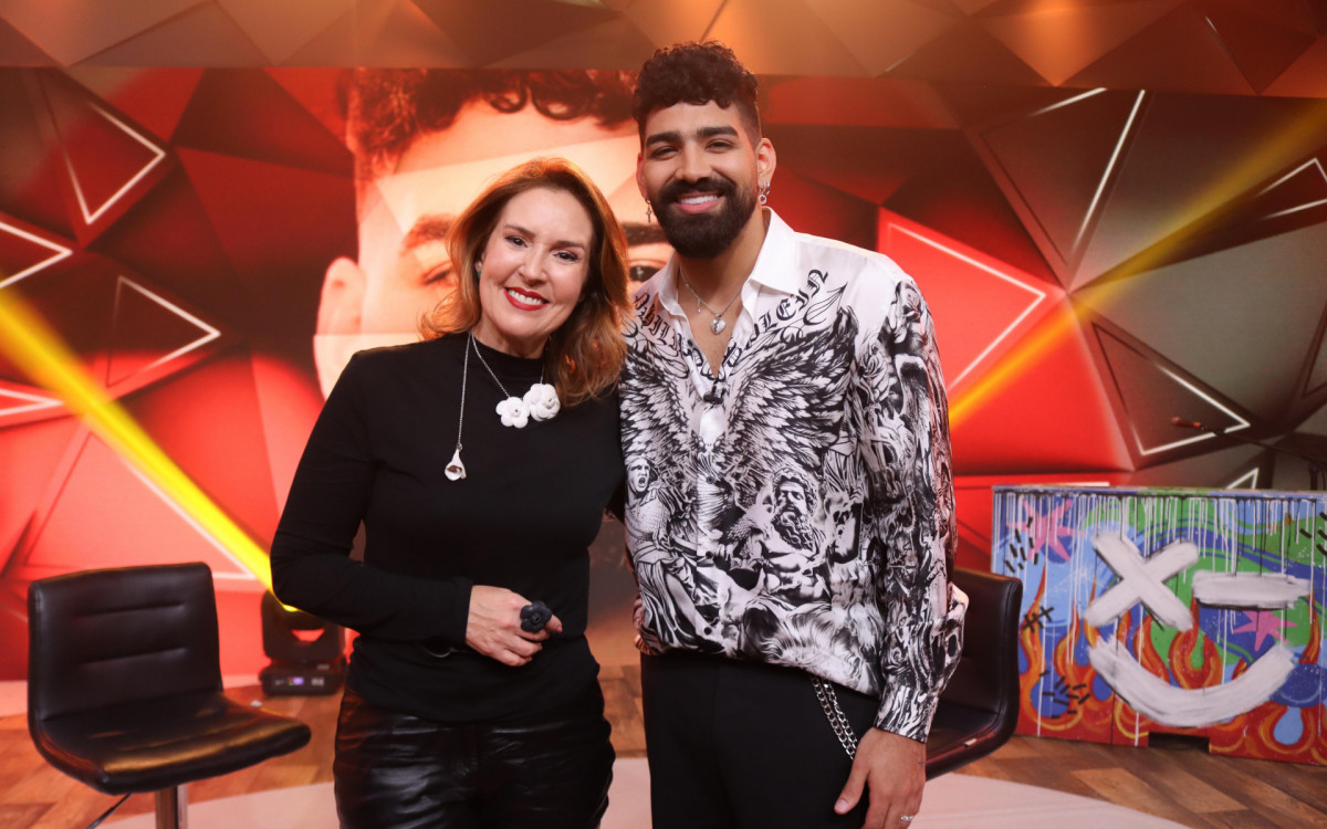 Dilsinho com a rep&oacute;rter Renata Capucci durante a entrevista ao 'Fant&aacute;stico'