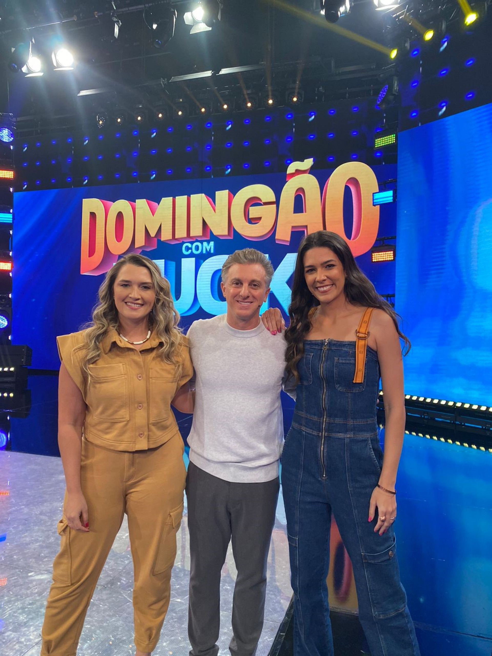 Luciano Huck, Renata Silveira e Ana Taís Matos

 - Divulgação / TV Globo