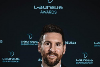 Messi aparece vestindo camisa de Maradona da Copa do Mundo de 1994