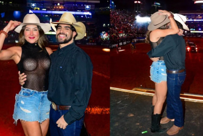 Caio Castro e a namorada, Daiane de Paula, trocam beijos em Festa do Peão de Barretos