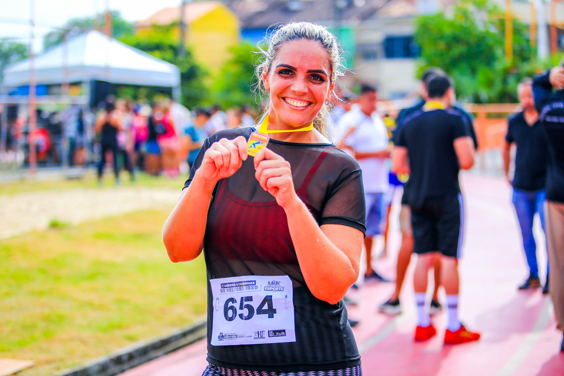A comerciante, Amanda dos Santos, 40 anos, estava animada por ter sido umas das primeiras a passar pela linha de chegada e ter concluído os 5km com sucesso - Rafael Barreto / PMBR