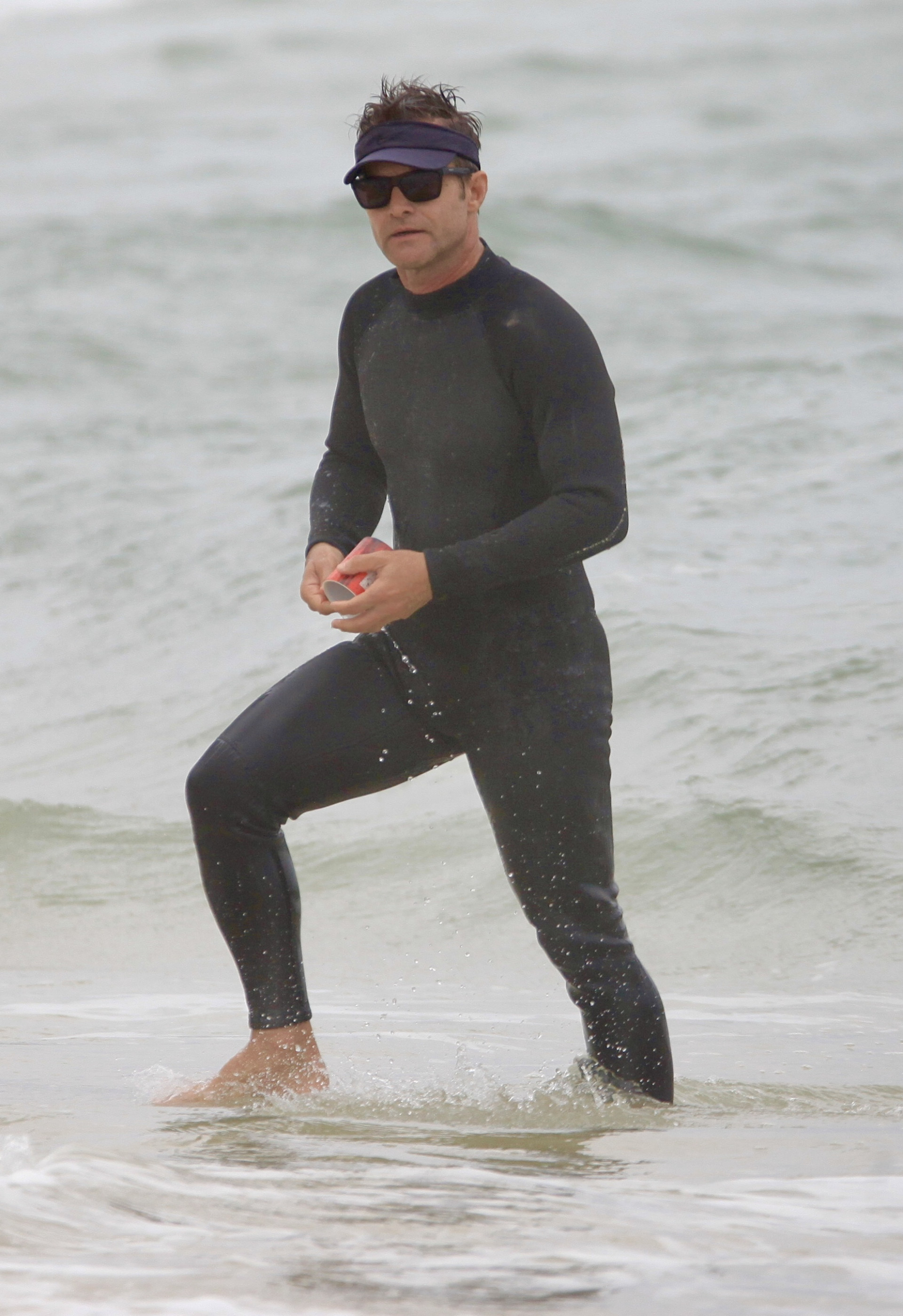  Claudio Heinrich curte dia de praia com a família - Fabrício Pioyani / Agnews