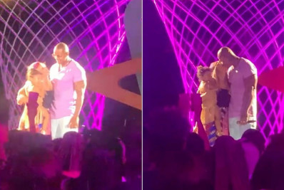 Léo Santana homenageia família e beija Lore Improta durante gravação de novo DVD