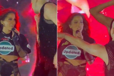 Bailarino esquece mudança capilar de Anitta e é corrigido por cantora no palco: 'Eu sou ruiva'