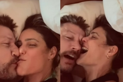 Fernanda Lima e Rodrigo Hilbert trocam chamegos na cama e comentam possibilidade de irem à Sapucaí