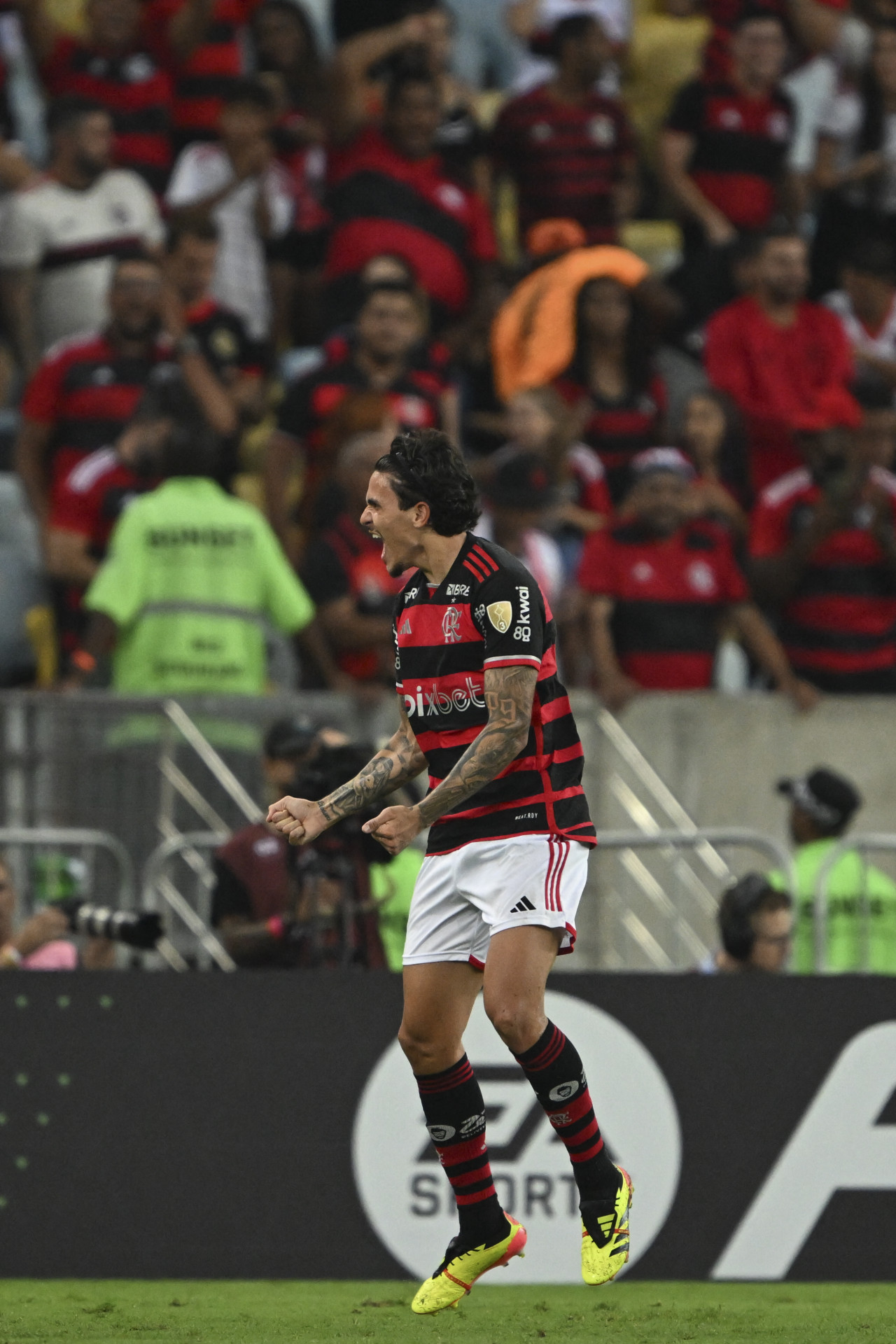 Flamengo\'s forward Pedro celebrates after scoringduring the Copa Libertadores group stage first leg football match between Brazil\'s Flamengo and Chile\'s Palestino at the Maracana Stadium in Rio de Janeiro, Brazil, on April 10, 2024.
MAURO PIMENTEL / AFP
