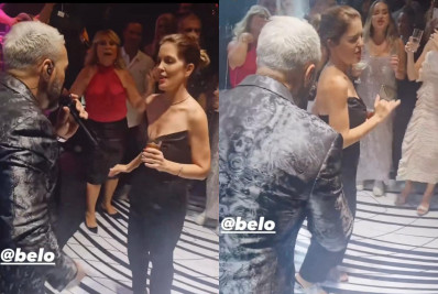 Mariana Gross se diverte sambando ao lado de Belo durante festa