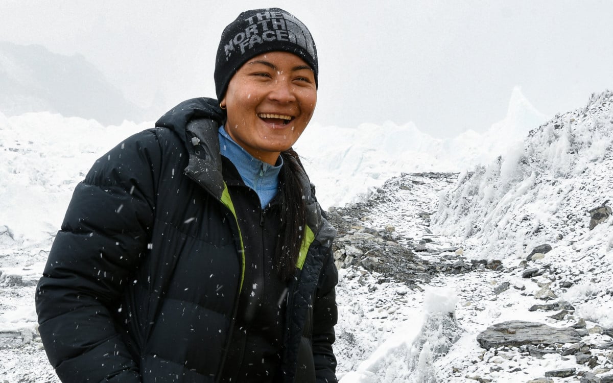 Phunjo Lama é a nova recordista da escalada ao Monte Everest 
 - Prakash Mathema / AFP