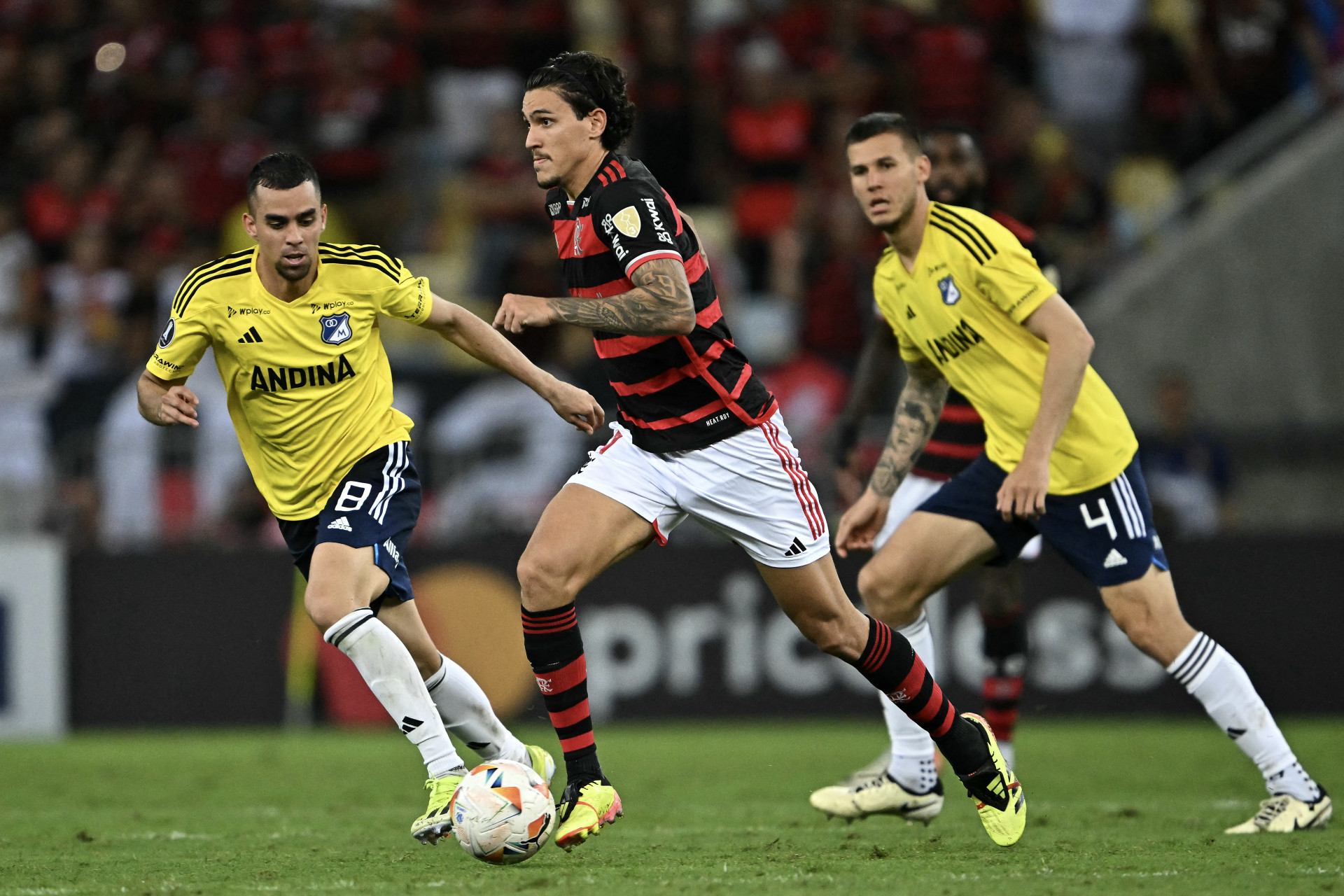 Lance do jogo entre Flamengo e Millonarios - Mauro Pimentel/AFP