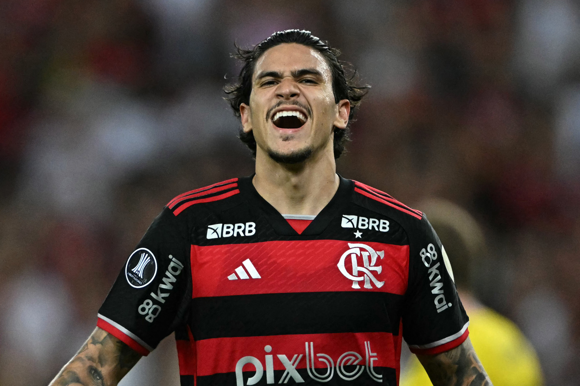 Pedro celebra gol marcado na vit&oacute;ria do Flamengo sobre o Millonarios - Mauro Pimentel/AFP