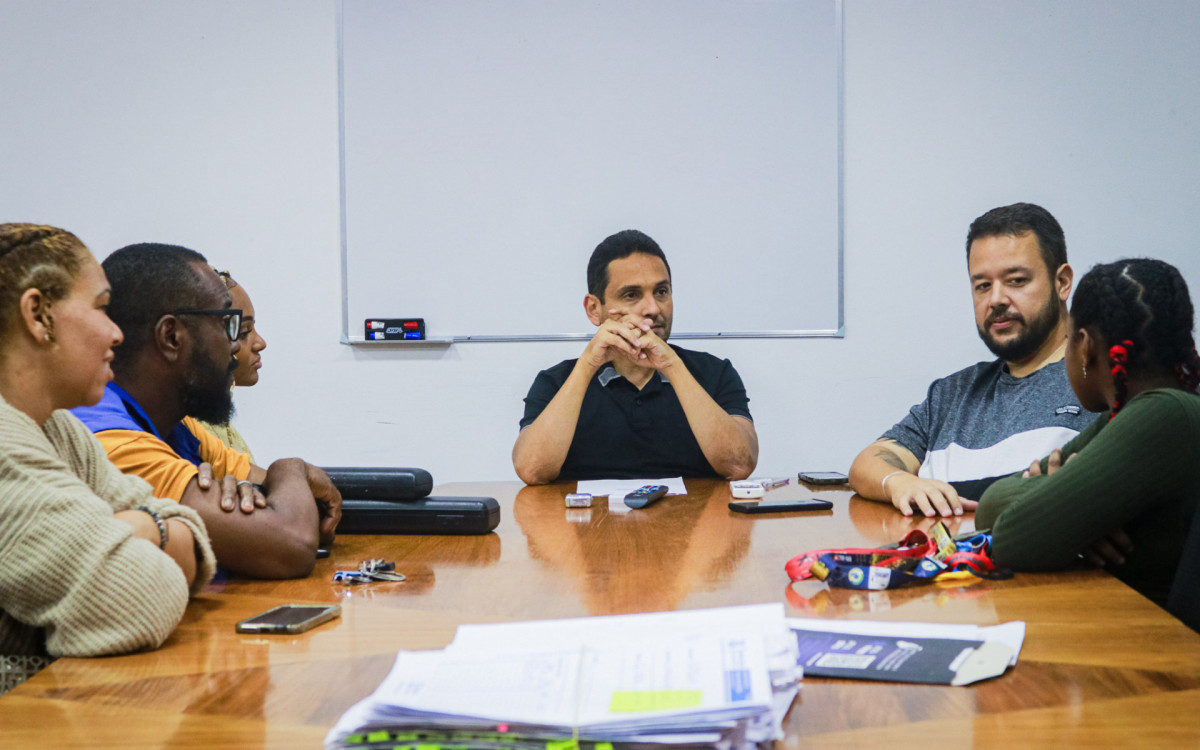 Reunião do prefeito com musicista e atleta