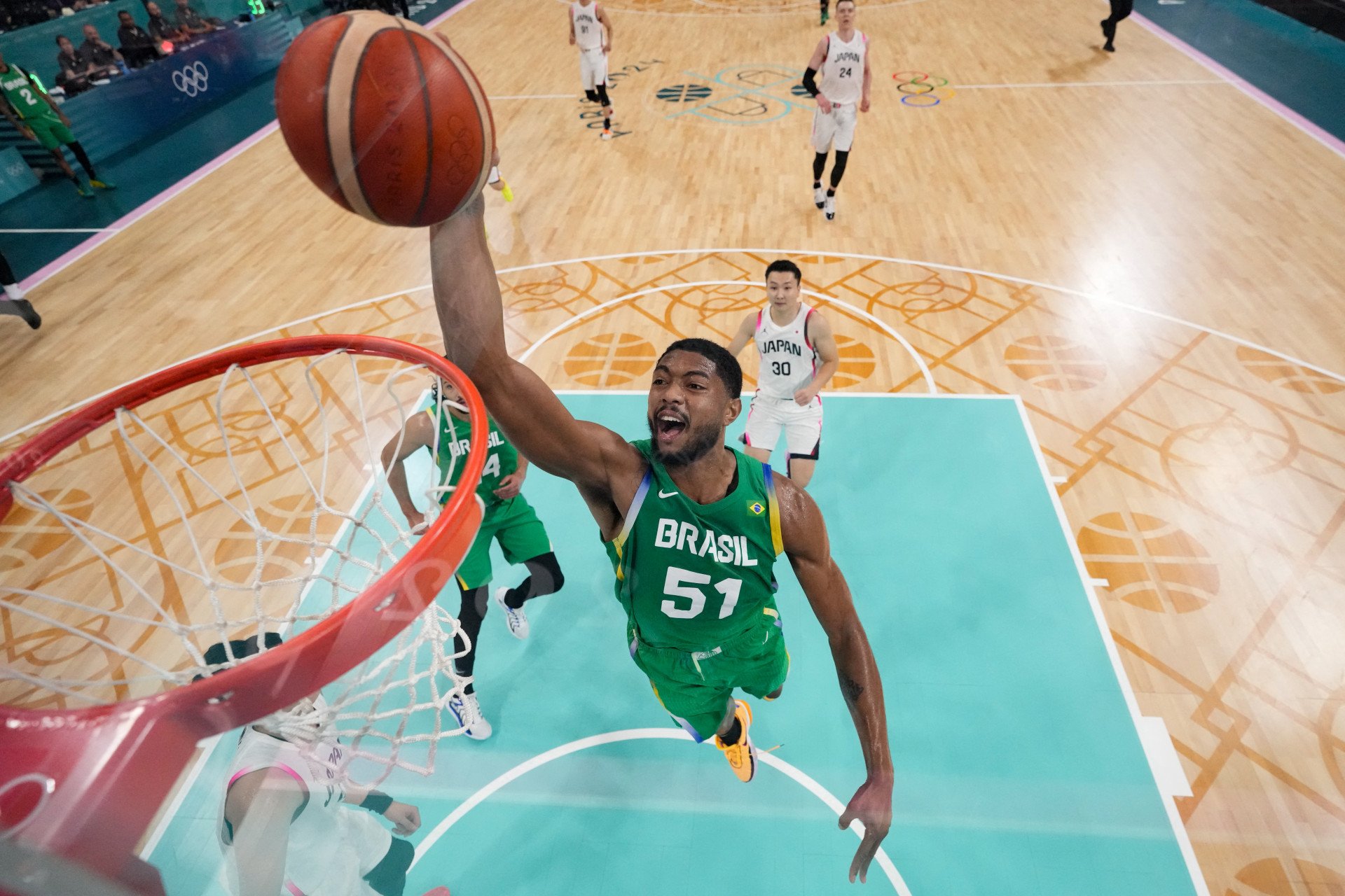 Bruno Caboclo foi o destaque do Brasil na vitória sobre o Japão no basquete  - Mark Terrill/AFP