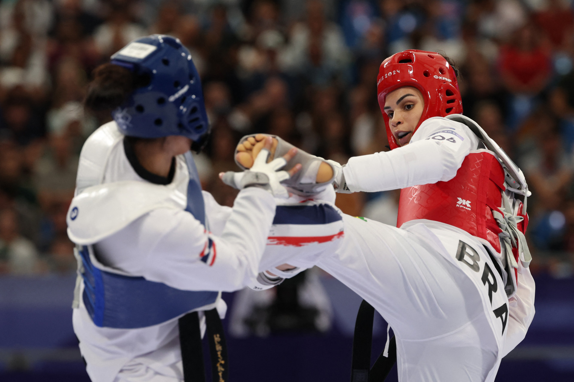 Carol Santos, a Juma, foi derrotada pela tailandesa nas oitavas de final do taekwondo - AFP