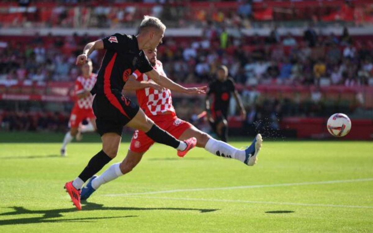 GIRONA, SPAIN - SEPTEMBER 15: Dani Olmo of FC Barcelona scores his team's third goal during the LaLiga match between Girona FC and FC Barcelona at Montilivi Stadium on September 15, 2024 in Girona, Spain. (Photo by David Ramos/Getty Images)