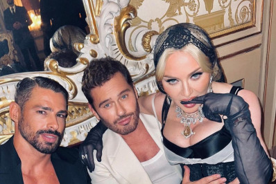 Madonna publica clique ao lado de Cauã Reymond 