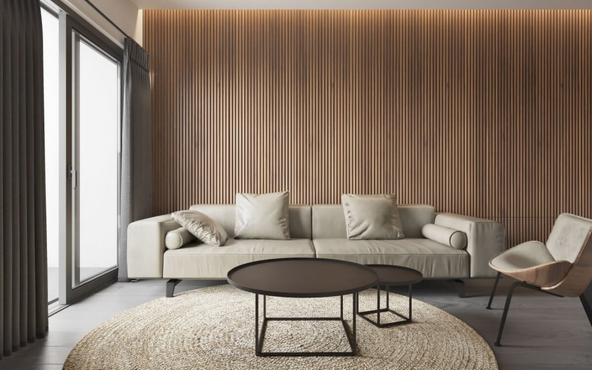 O revestimento ajuda a transformar o visual da sala de estar (Imagem: Polnon Prapanon | Shutterstock)