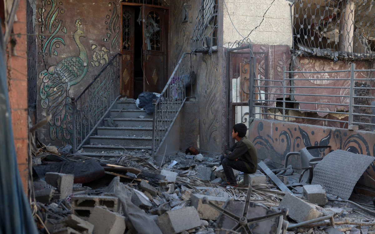 Dezenas de pessoas tiveram suas casas destruídas - Reprodução / Eyad Baba / AFP