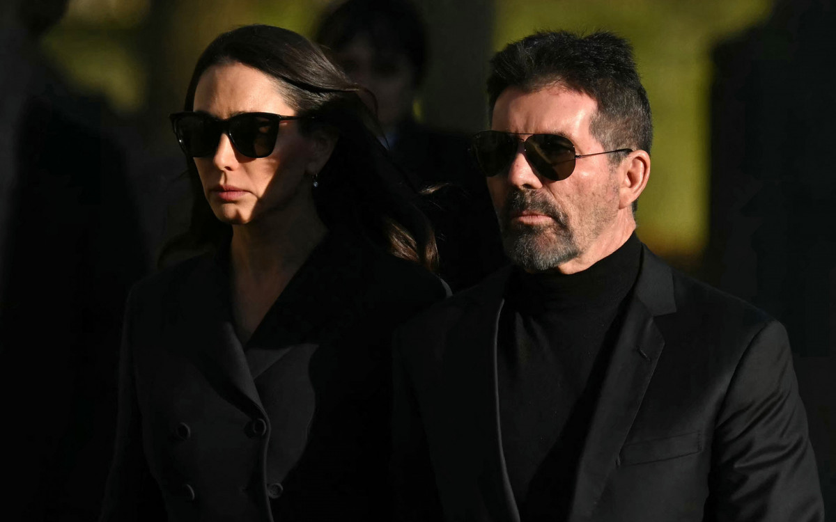 executivo e produtor de televisão Simon Cowell e Lauren Silverman - AFP