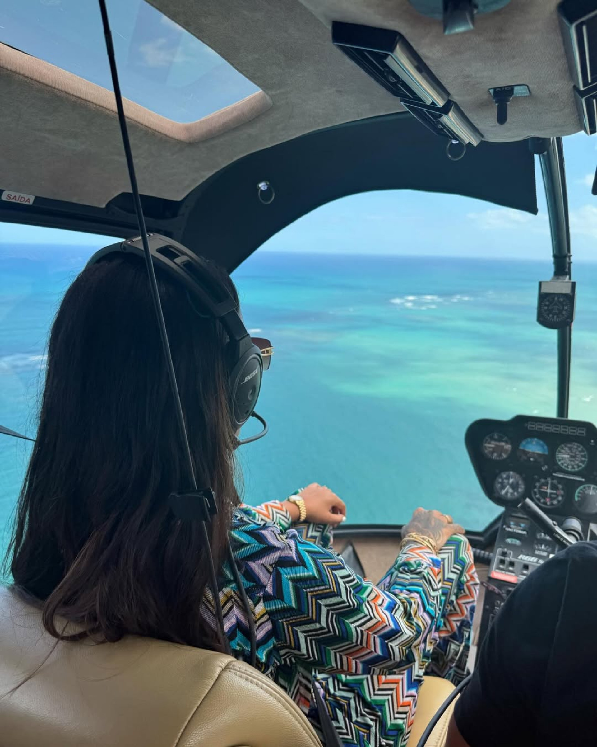 Ludmilla durante viagem de helicóptero  - Reprodução / Instagram 