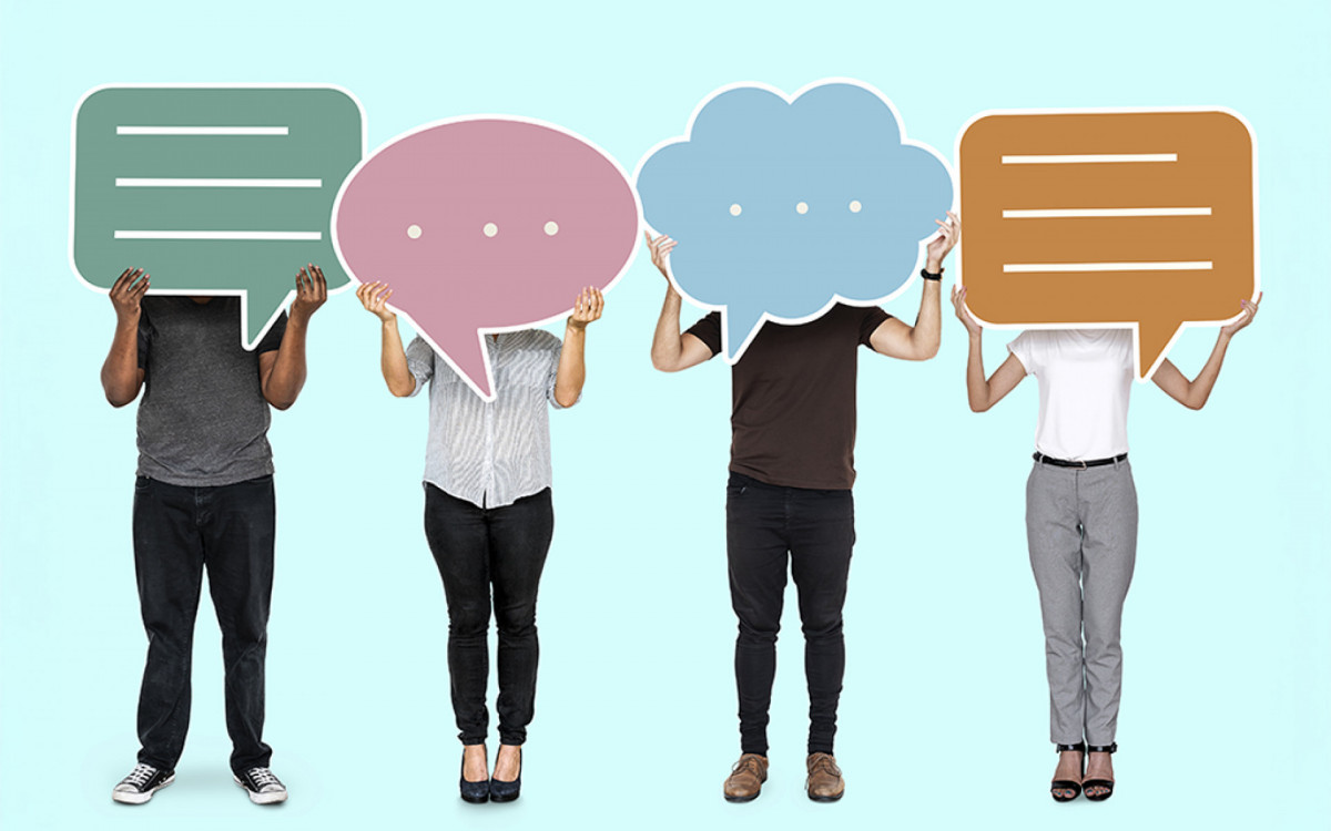 Diverse people showing speech bubble symbols