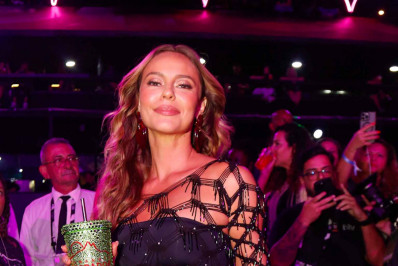 Famosos marcam presença no último dia de desfiles do Grupo Especial