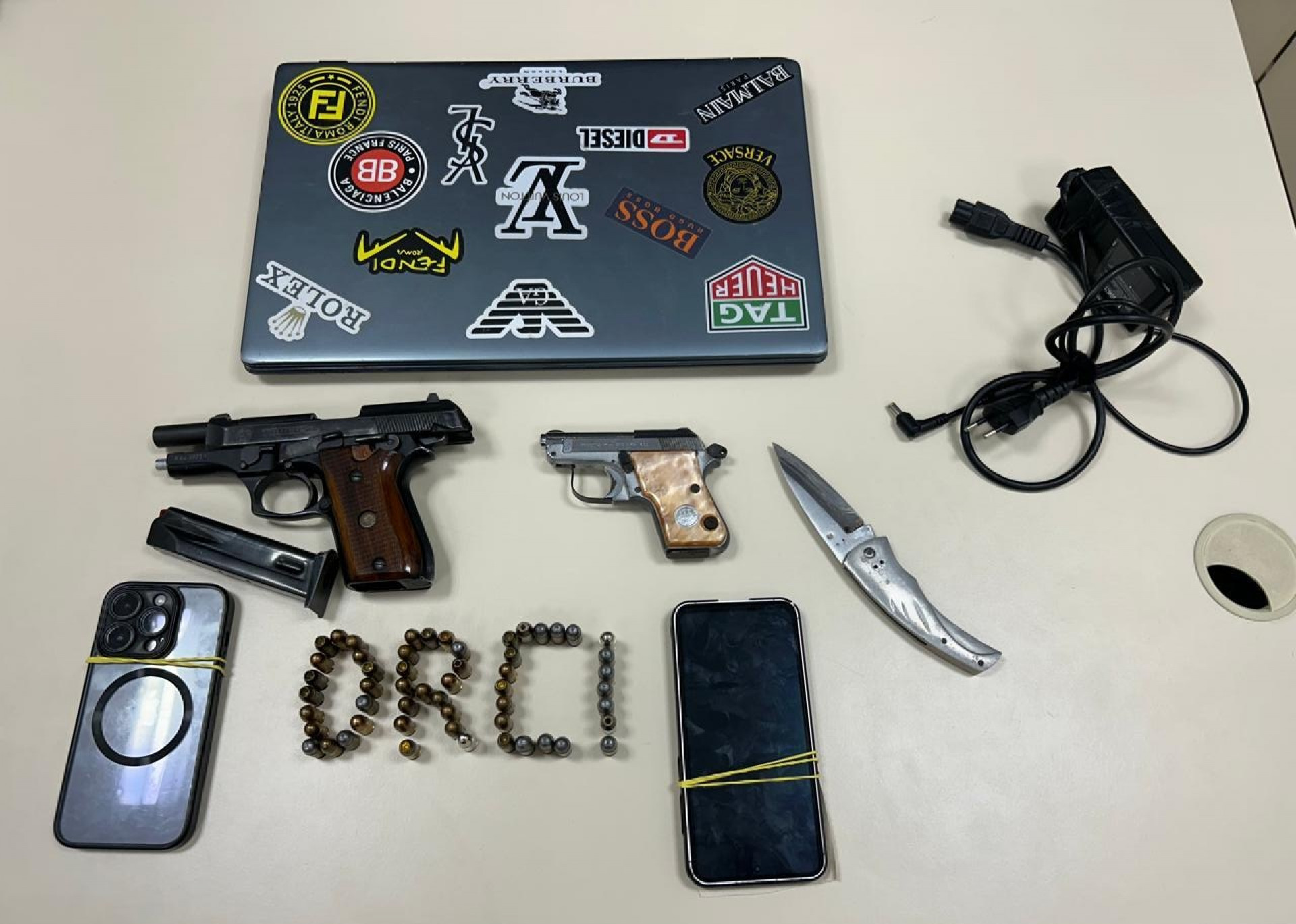 Material apreendido na casa do acusado - Reprodução