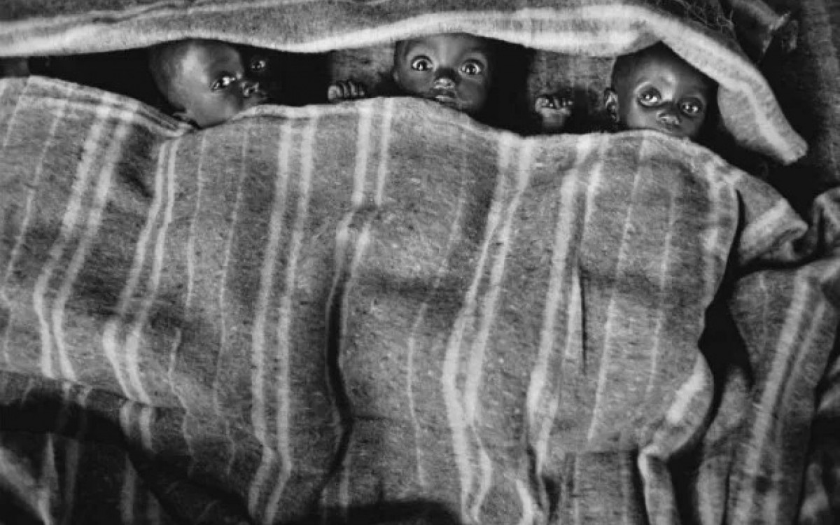 Série Êxodo - foto de três crianças negras 