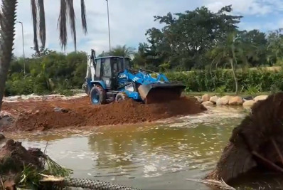 Vídeo: Área alagada de 'resort' de Peixão, na Zona Norte, é soterrada